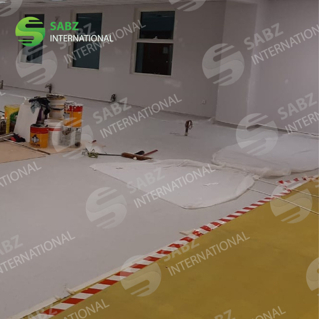 Hygienic vinyl flooring in a hospital patient room, designed for easy cleaning and patient comfort.